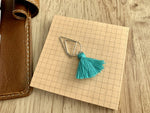 Load image into Gallery viewer, Teal Tassel Silver Clip
