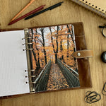 Load image into Gallery viewer, Autumn forest pathway - Fall Dashboard - Fits A5, B6, Personal Wide, Personal, A6, Pocket, Mini Ring Planners. Protective Cover.
